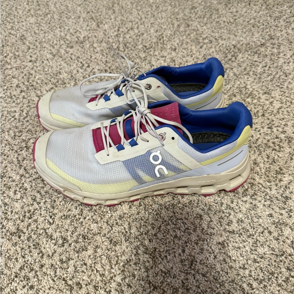 On Running White and Blue Sneakers
